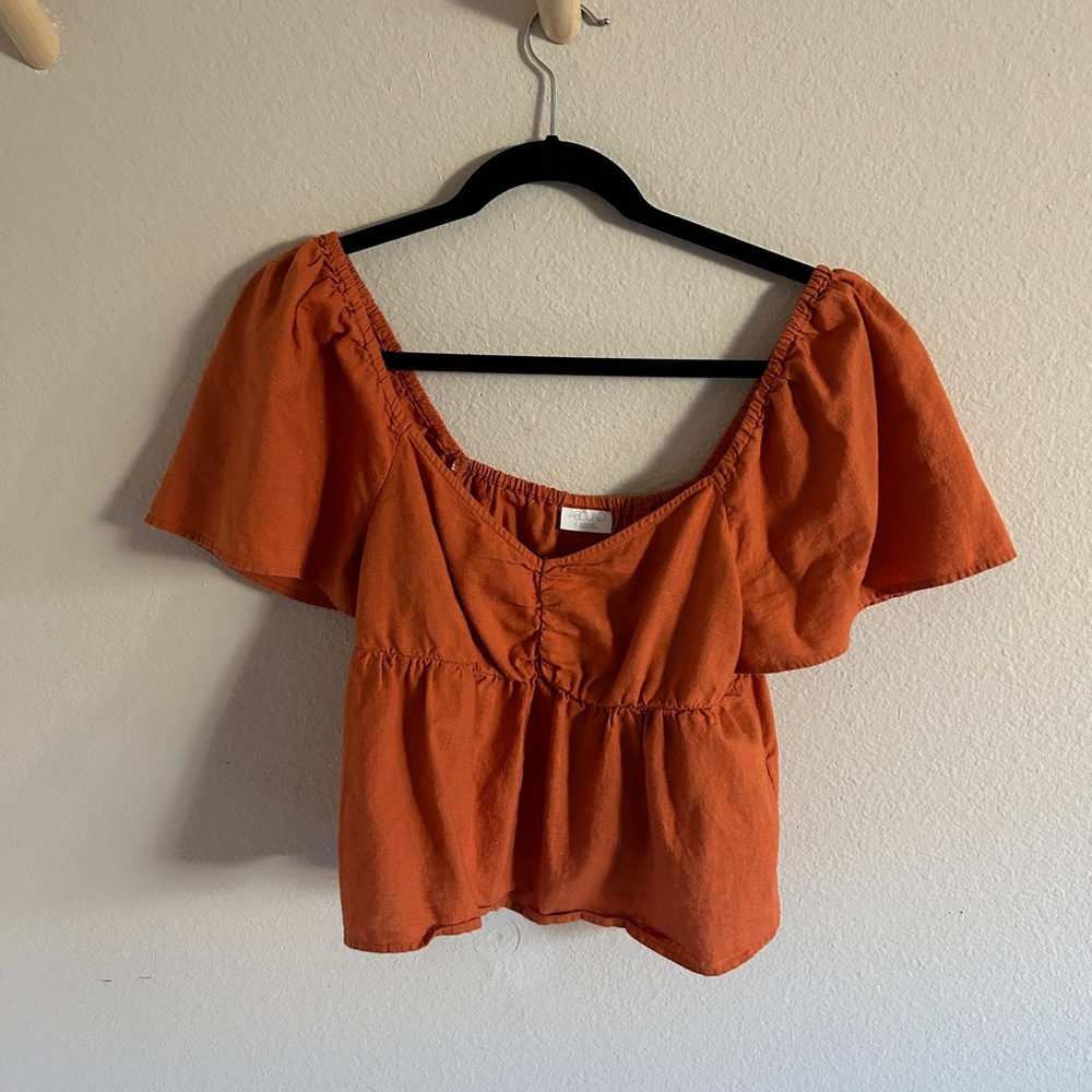 Burnt orange off the shoulder babydoll top